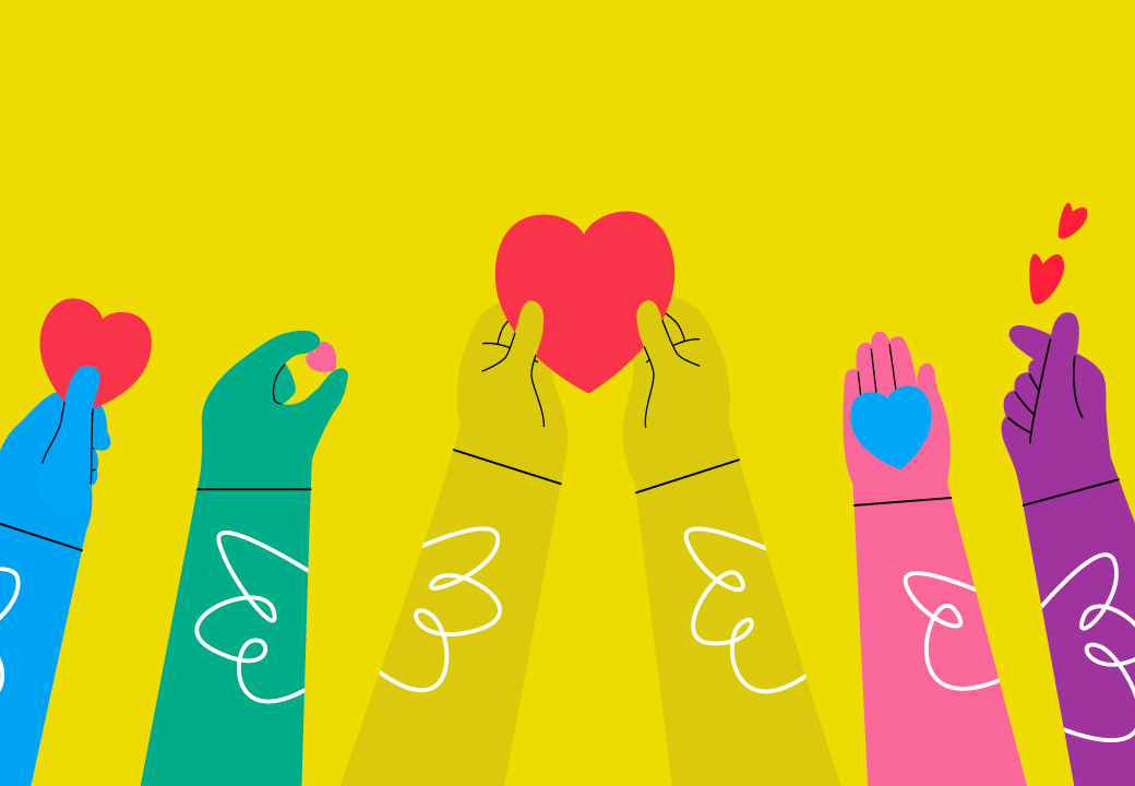 mani colorate tengono un cuore