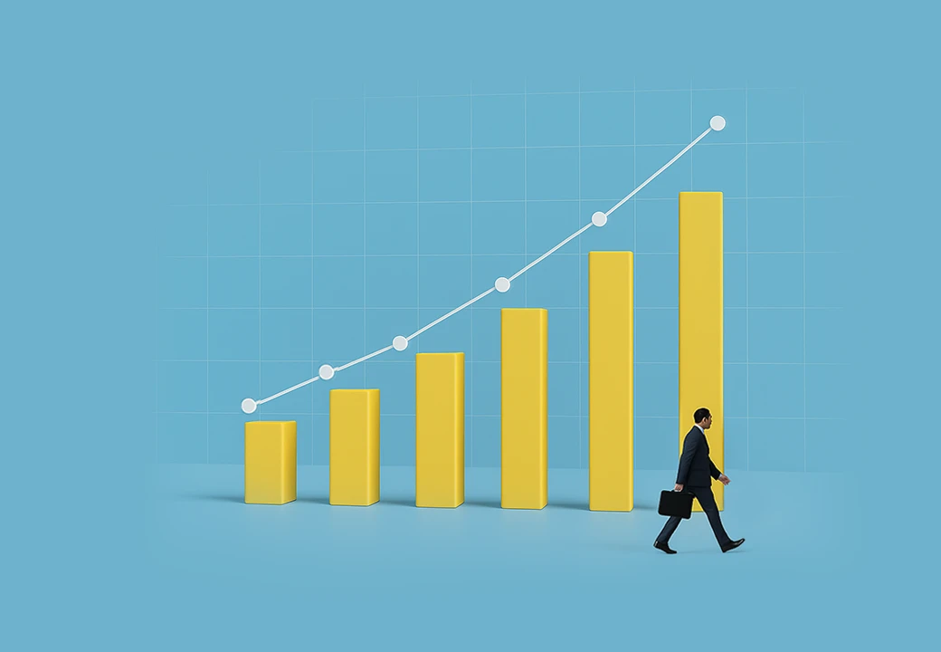 Un uomo in giacca e cravatta con una valigetta cammina davanti a un grande grafico a istogrammi