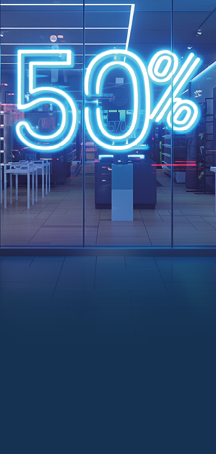Scritta 50% sullo sfondo di un negozio con luci al neon blu
