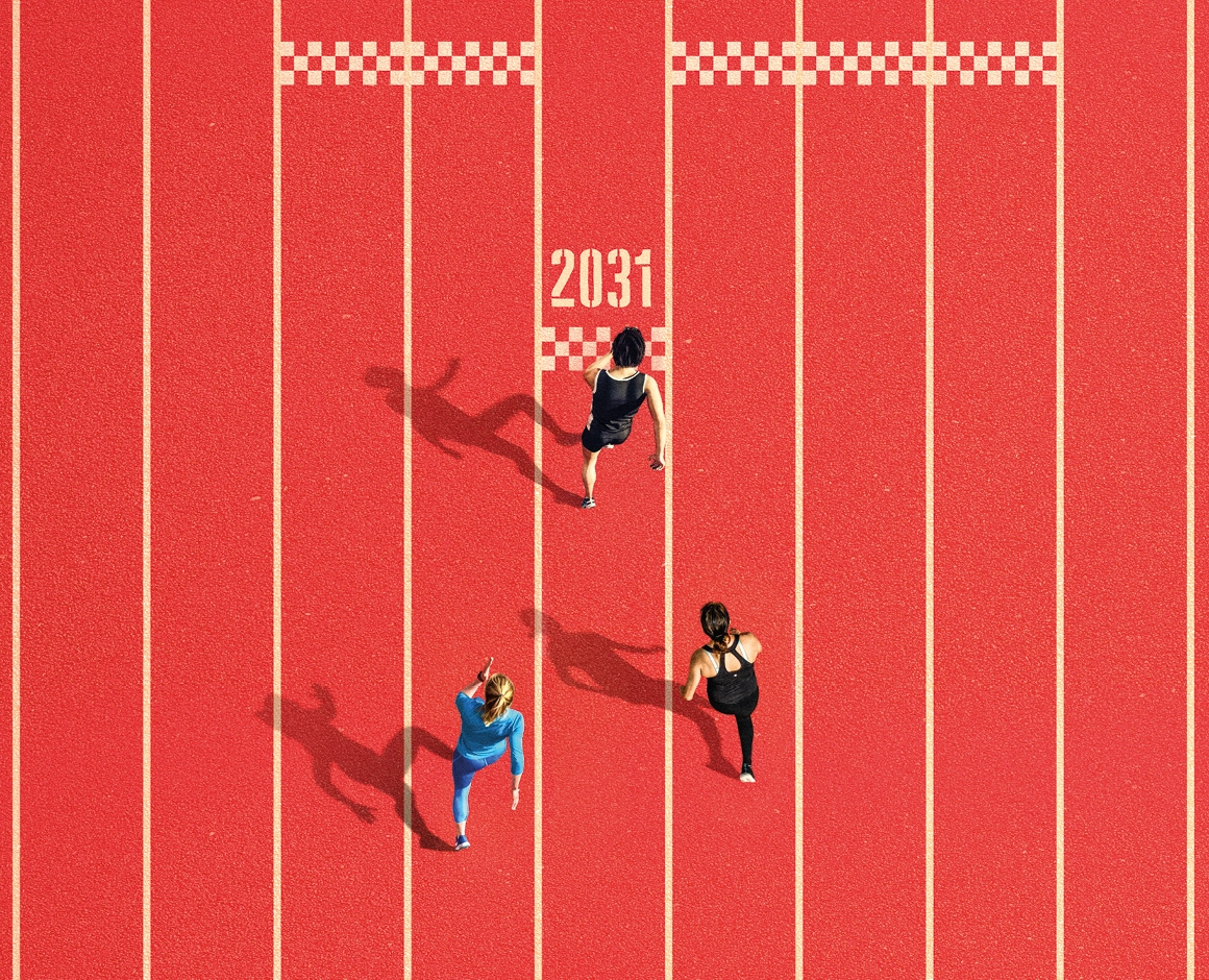 Pista di atletica con donne che corrono